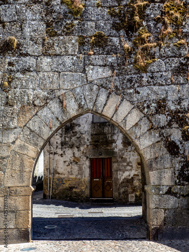 Fototapeta Naklejka Na Ścianę i Meble -  View of one of the old gateways of the city wall of Guarda, Portugal