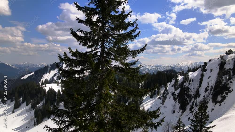 Aerial of the bavarian alps in winter with Roßstein in the background, 4K, drone, Germany, Europe Aerial of the bavarian alps in winter with Roßstein in the background, 4K, drone, Germany, Europe