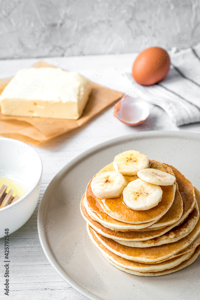 cooked pancake on plate at wooden background cooked pancake on plate at wooden background