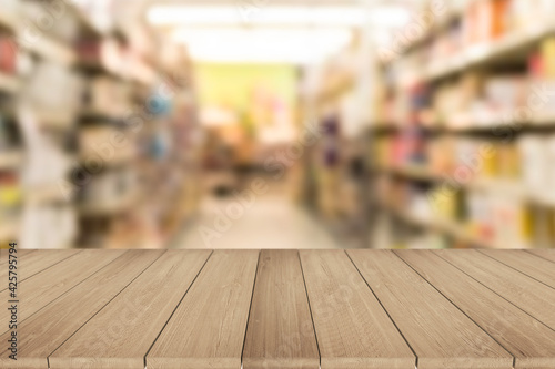 Wooden board empty table in front of blurred background. Can be used for display or montage your products.Mock up for display of product.