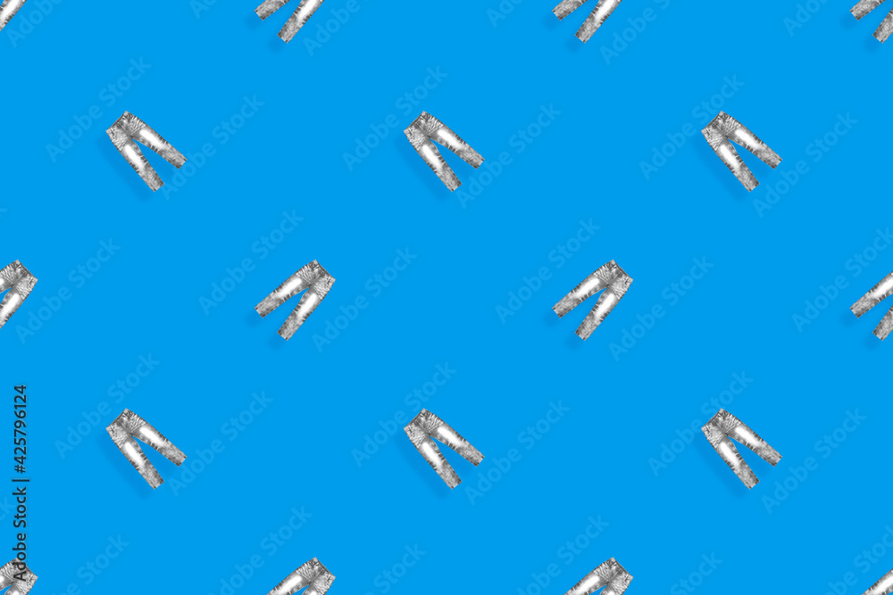 Denim pants seamless pattern. Bright background from jeans. Denim pants seamless pattern. Bright background from jeans.