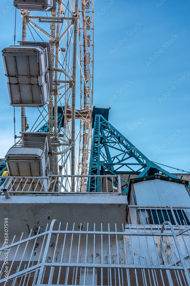 Steel structure of Ferris wheel. Lines of modern architecture and equipment.