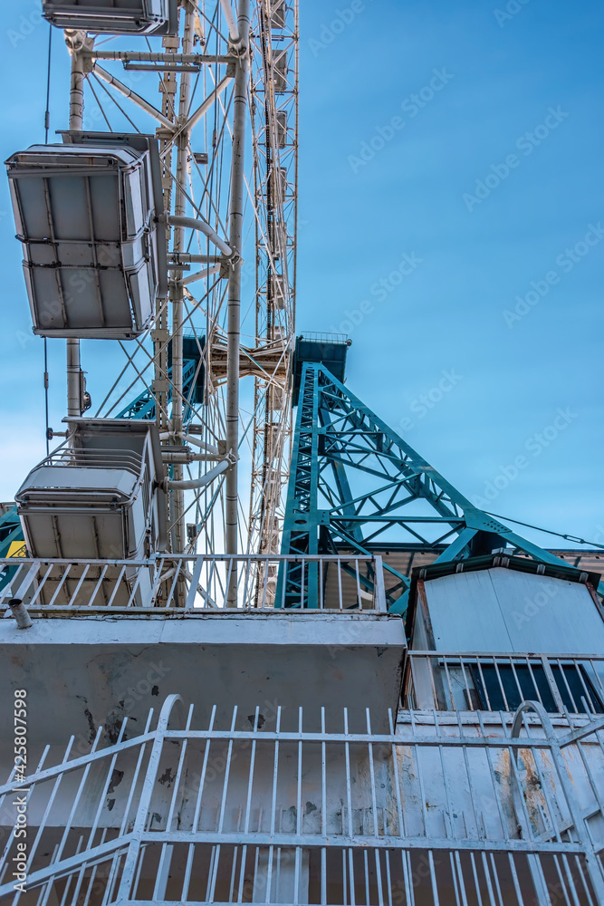 Steel structure of Ferris wheel. Lines of modern architecture and equipment. Steel structure of Ferris wheel. Lines of modern architecture and equipment.