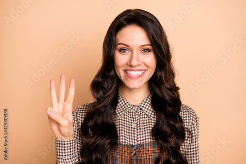 Murais de parede Photo of young excited attractive girl happy positive smile show three fingers i