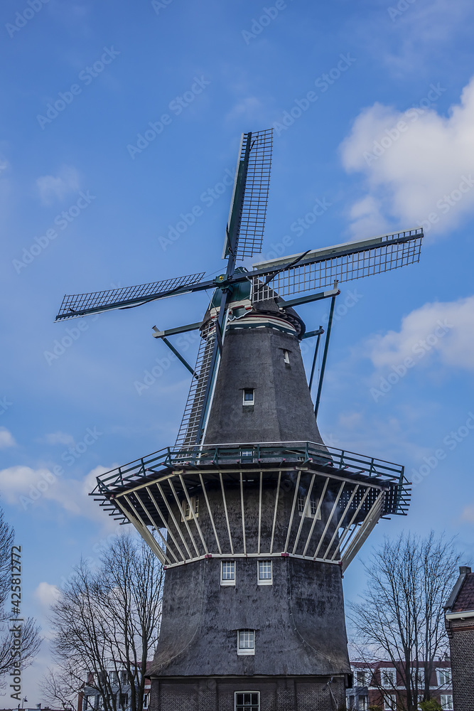 De Gooyer Windmill - Amsterdam most iconic mill. De Gooyer Windmill - was built in 1725 - the tallest wooden mill in the Netherlands. Amsterdam, Netherlands.