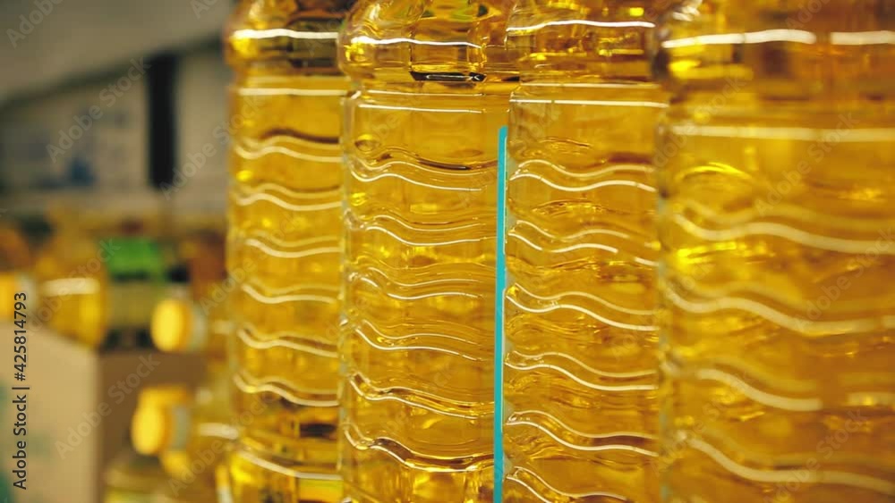bottles of sunflower oil close up at the grocery store. Close-up selective focus