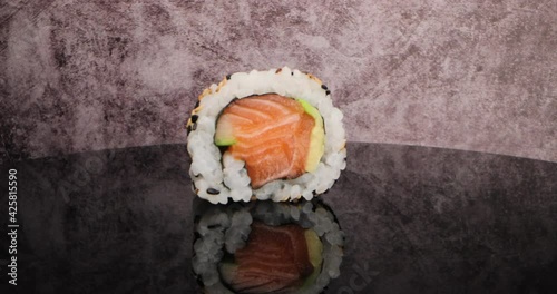 Salmon Roll Uramaki Sushi - Rotation Zoom In photo