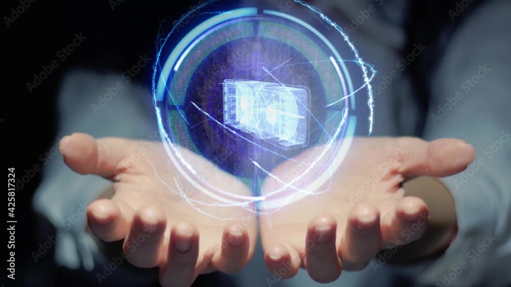 Female hands show a round conceptual hologram with GPU high tech video card. Unrecognizable woman in ashen white on a black background with future holographic technology Female hands show a round conceptual hologram with GPU high tech video card. Unrecognizable woman in ashen white on a black background with future holographic technology