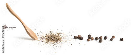 Foto Wooden spoon ground black pepper and ground black pepper on white background