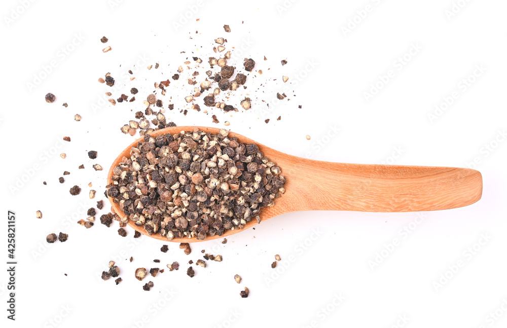 Ground black pepper isolated on a white background. Top view Ground black pepper isolated on a white background. Top view