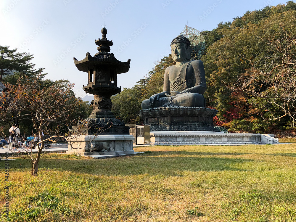 buddha statue in sinheungsa temple on the slopes of seoraksan mountain in sokcho, gangwon province, south korea