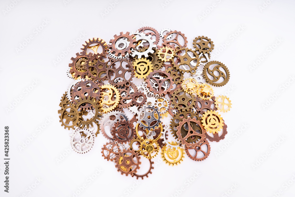 Pile of gear wheels and cogs in different colors Pile of gear wheels and cogs in different colors