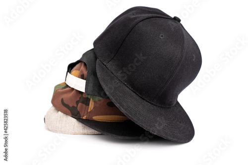 Snapback hats in different colors stacked on top of each other