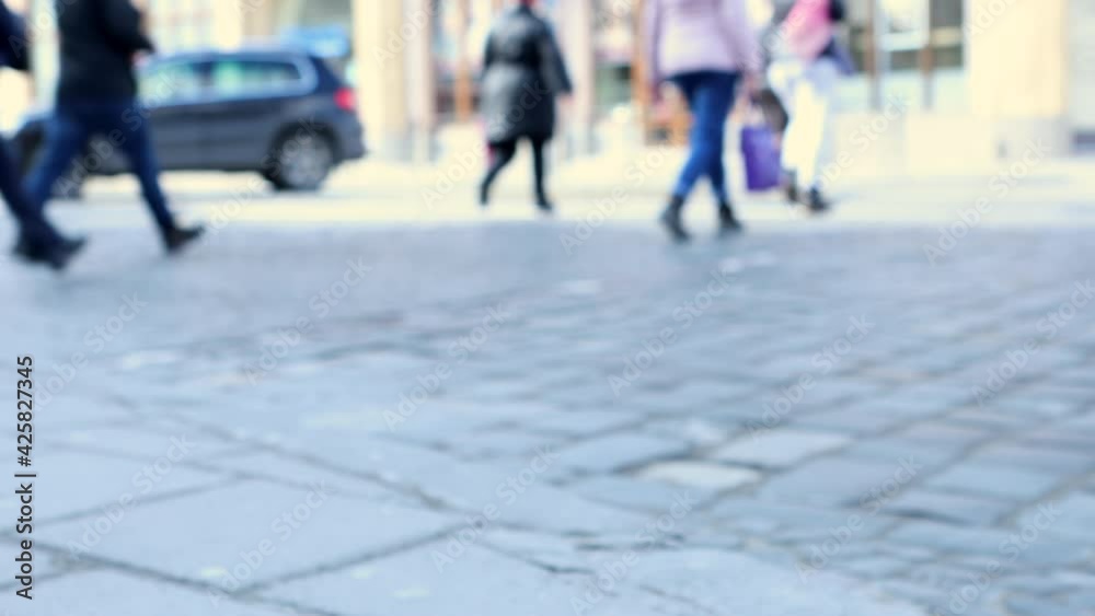 close up people legs walking by crosswalk close up people legs walking by crosswalk