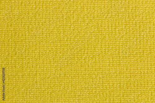 Yellow background, texture of silicone mat