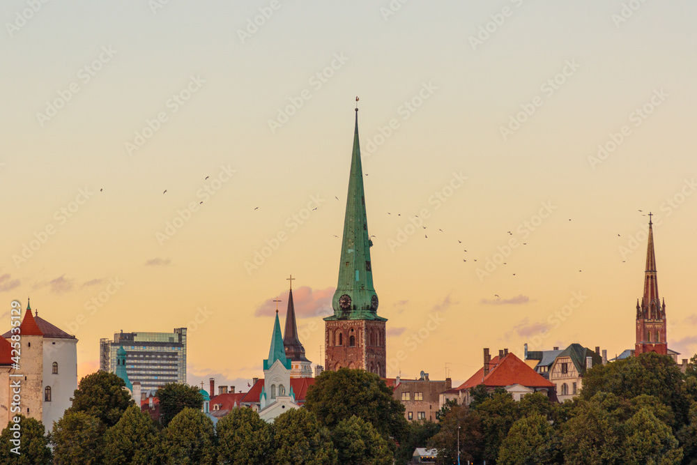 skyline of old town of Riga, Latvia, at dusk or down
