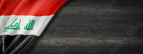 Iraqi flag on black wood wall banner
