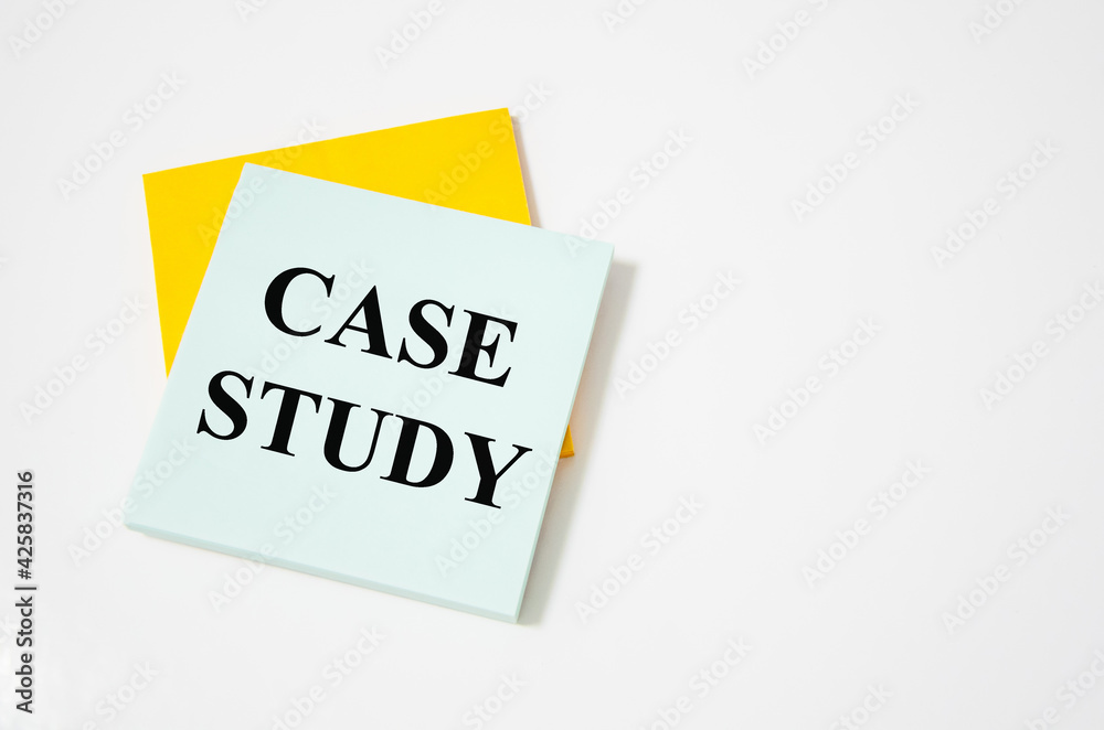 Case study text written on a white notepad with colored pencils and a yellow background Case study text written on a white notepad with colored pencils and a yellow background