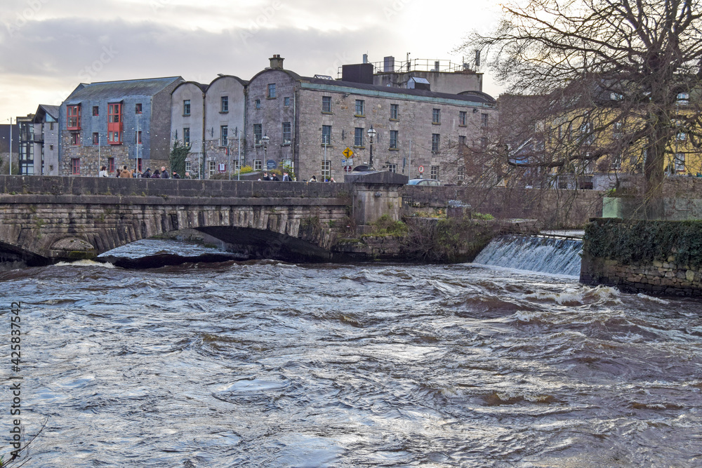 Bridge over the river Corrid with typical buildings in Galway, Ireland