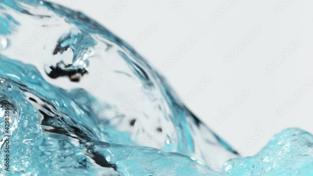 Super slow motion of splashing water, close-up. Filmed on high speed cinema camera, 1000 fps. Super slow motion of splashing water, close-up. Filmed on high speed cinema camera, 1000 fps.