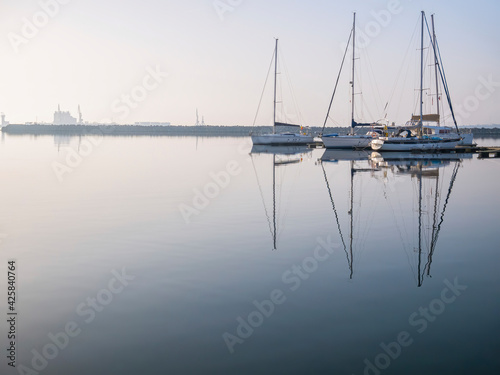 Many boats and yachts anchored at the touristic port or harbor in Mangalia, Constanta