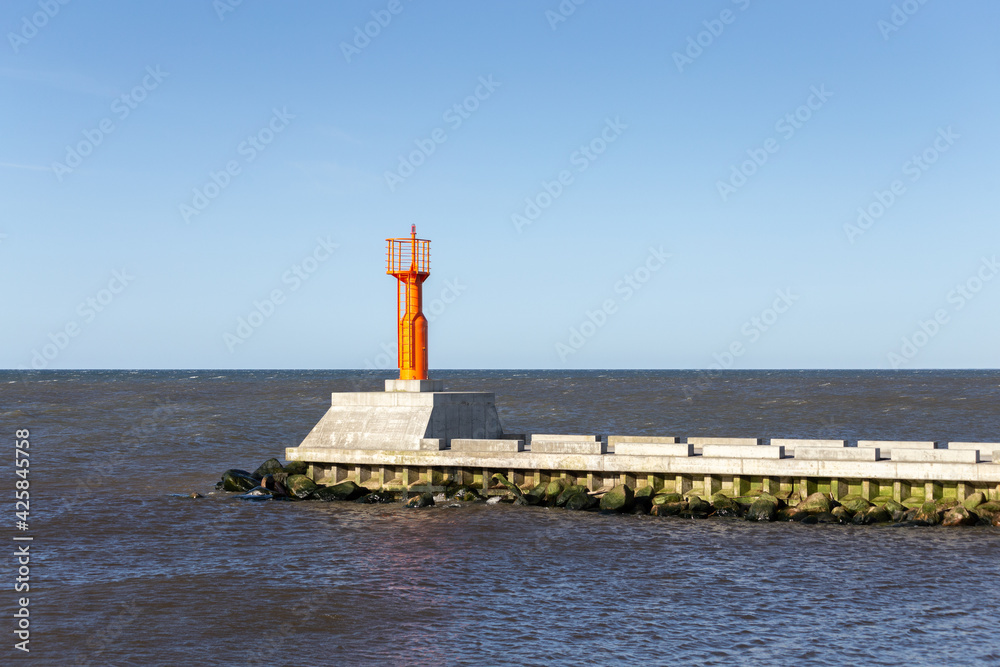 Red lighthouse in the Baltic Sea.