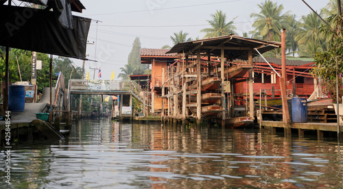 Damnoen Saduak Floating Market.Boat storage between houses on the water