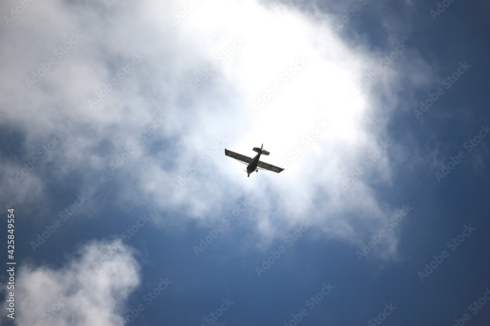 Clear blue skies with passengers being flown through it