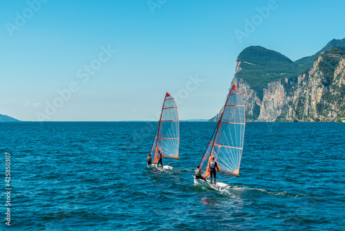 Beautiful peaceful lake Garda, Italy. Sailing boat. © karamysh