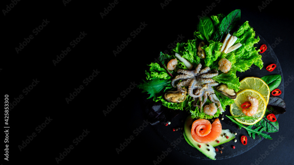 Fototapeta premium Photo of an octopus on a black board