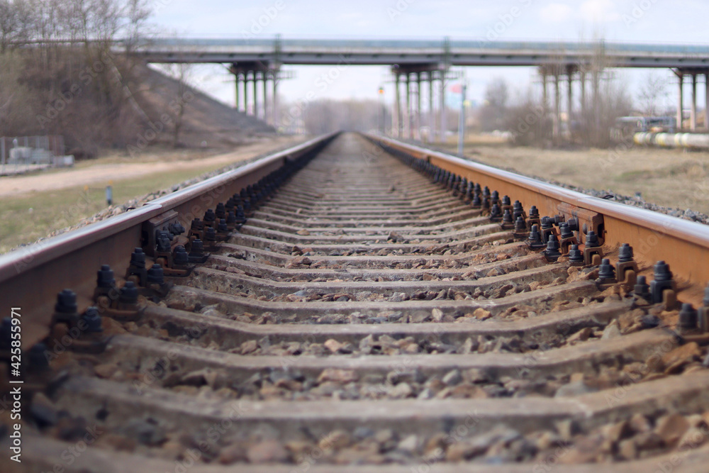 Rails leading into the distance for the train Rails leading into the distance for the train