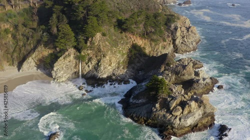 Forward Aerial Pan of McWay Falls on the Coast of Big Sur Along State Route 1