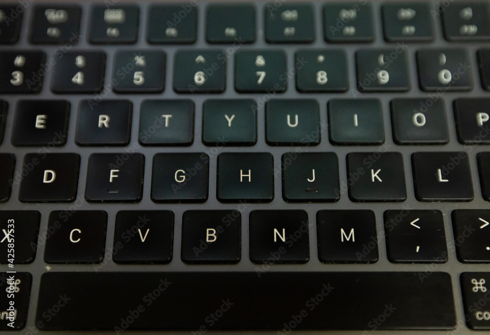 Close up of the letter keys on a black modern keyboard Close up of the letter keys on a black modern keyboard