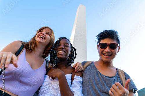 Young people visiting the attraction of a big city