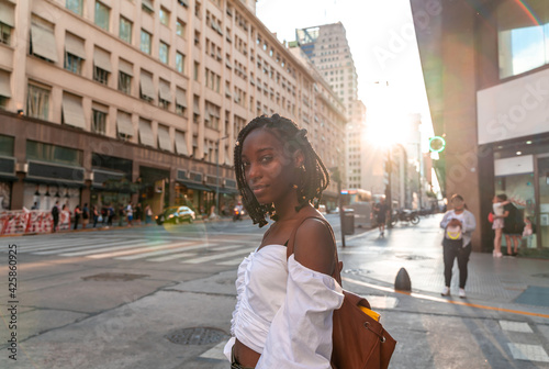 A beautiful black woman on the street