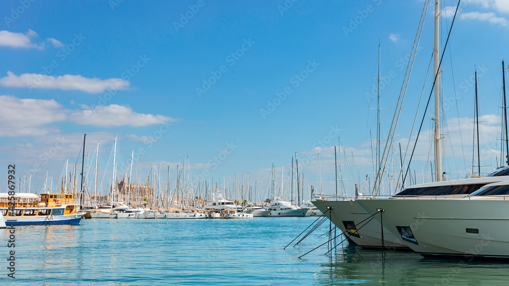 Luxury yachts moored in the seaport of the Spanish city of Palma de Mallorca