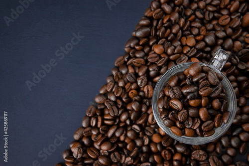 Coffee beans texture or coffee beans background. Brown roasted coffee beans. Closeup shot of coffee beans. © 151115
