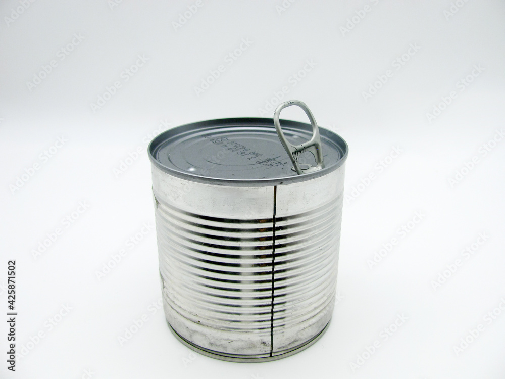 Tin can bagna with an open ring on a white background. Tin can bagna with an open ring on a white background.