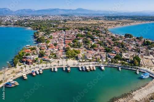 Aerial View Of Side Antique City . Side Old Town amphitheater. Side Harbor marina in Antalya Turkey drone view © Chawran