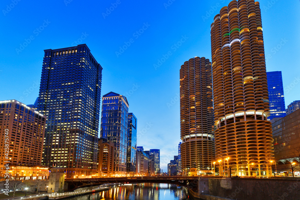 Obraz premium Chicago skyline after sunset showing Chicago downtown. Chicago, on Lake Michigan in Illinois, is among the largest cities in the U.S. 