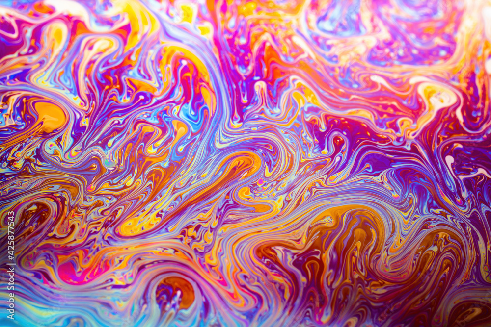 Macro picture of soap bubble psychedelic color background