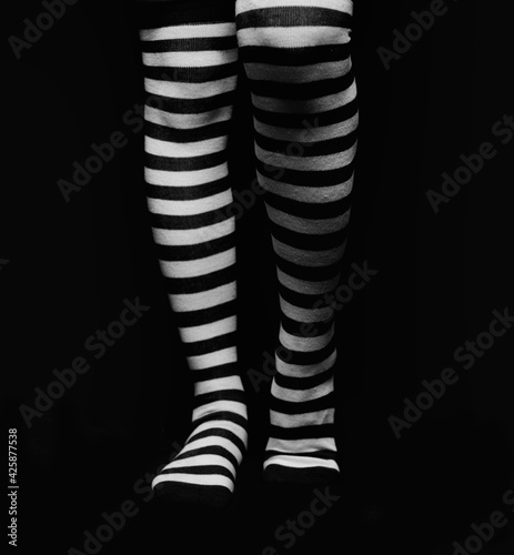 Legs with striped socks photo