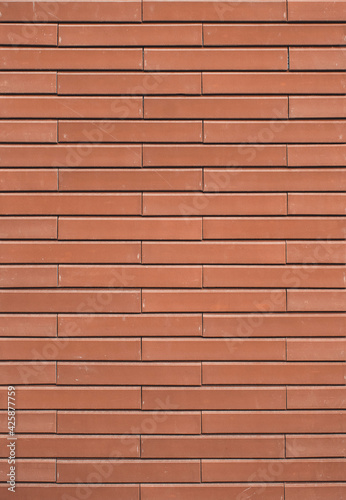 Old orange brick wall , red brick , old grunge stone wall texture . Modern style vintage brick texture