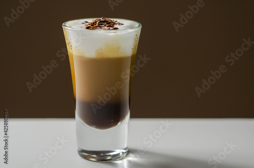 Wallpaper Mural Coffee drink shot with a nutty note with fluffy milk foam, decorated with chocolate shavings Torontodigital.ca