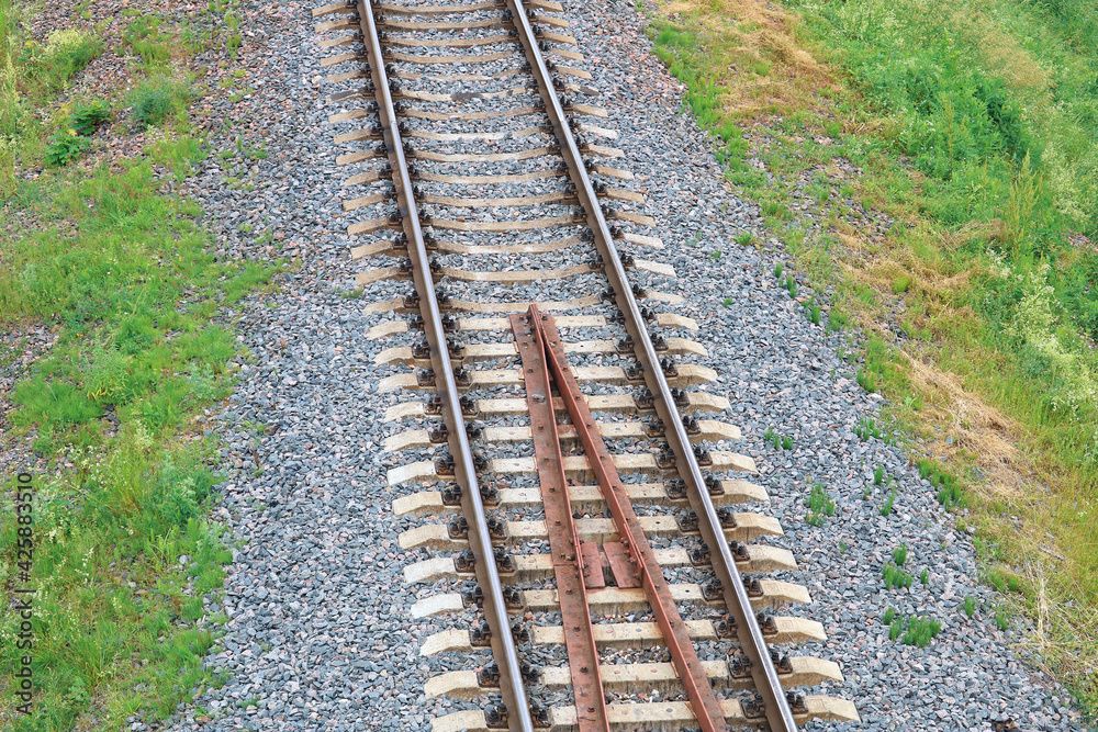 Fototapeta premium guard rails or check rails on the railway bridge 