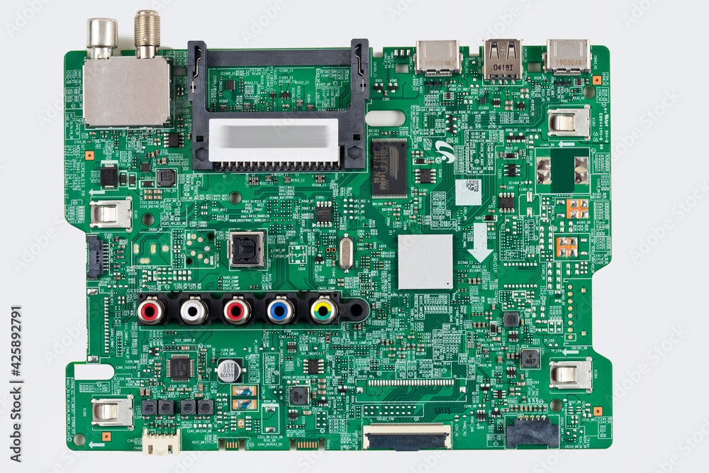 Electronic board with radio parts, connectors, slots and chip processor from electronic device isolated on a white background. Top view. Electronic board with radio parts, connectors, slots and chip processor from electronic device isolated on a white background. Top view.