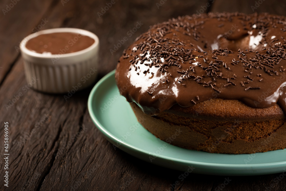 Homemade chocolate cake with chocolate sauce topping. Homemade chocolate cake with chocolate sauce topping.