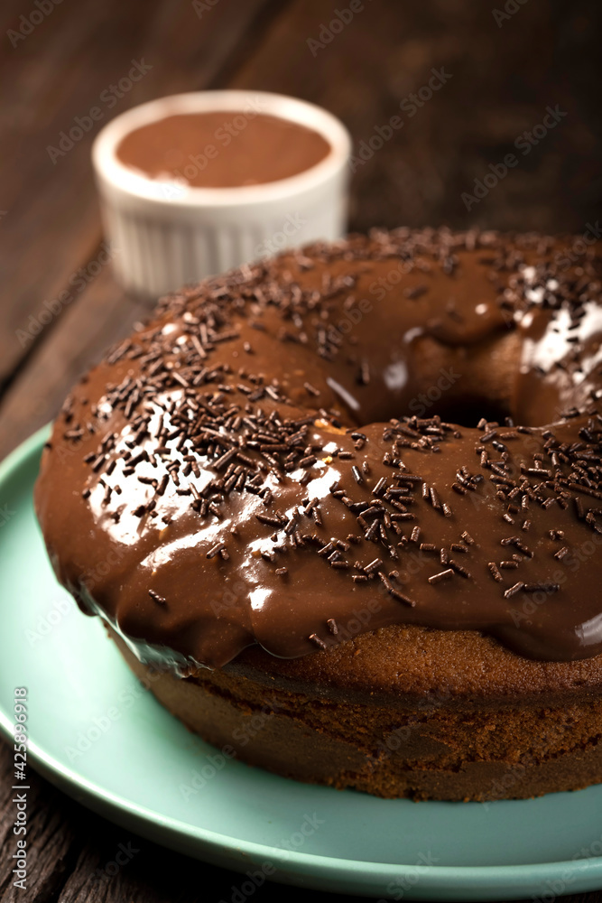 Homemade chocolate cake with chocolate sauce topping. Homemade chocolate cake with chocolate sauce topping.