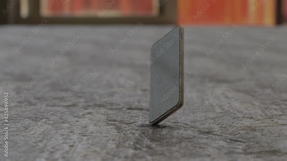 3D Rendering of  a smartphone falling and cracking after hitting the floor in slow motion