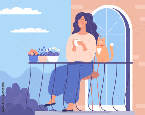 Young woman drinking coffee on her balcony apartment with a cute cat